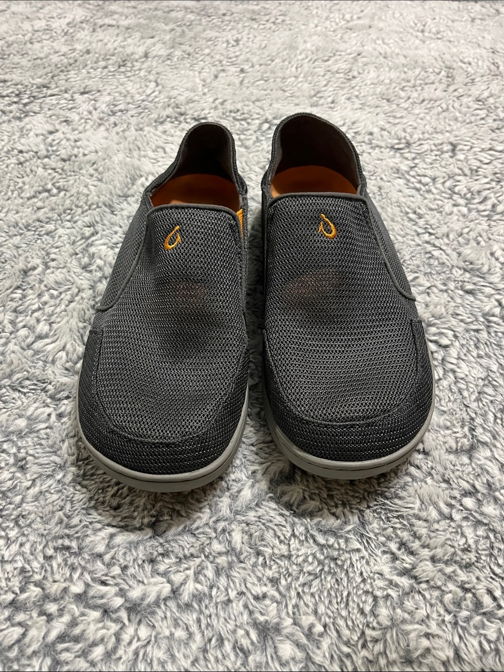 OluKai Men's Charcoal Mesh Slip-Ons with Orange Logo